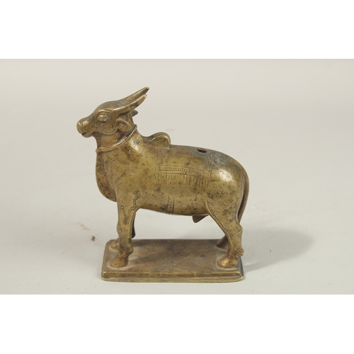 140 - A FINE 18TH CENTURY SOUTH INDIAN BRONZE NANDI BULL, 14cm high.