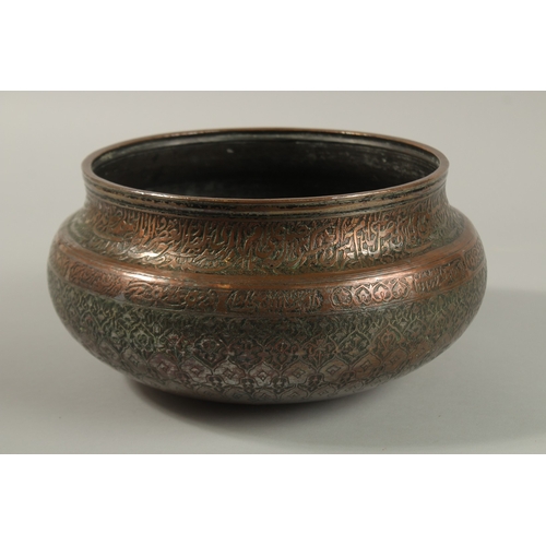 146 - A FINE 17TH-18TH CENTURY PERSIAN SAFAVID ENGRAVED TINNED COPPER BOWL, with two rows of very fine cal... 