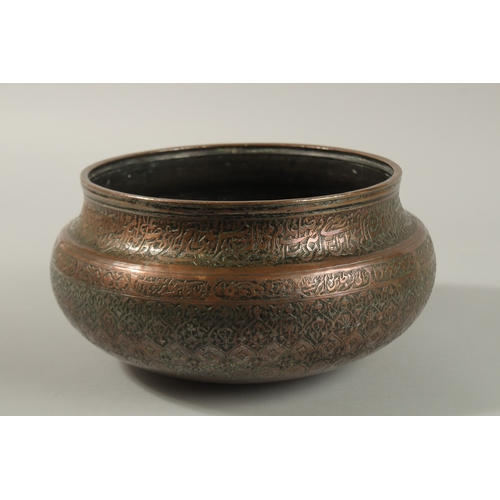 146 - A FINE 17TH-18TH CENTURY PERSIAN SAFAVID ENGRAVED TINNED COPPER BOWL, with two rows of very fine cal... 