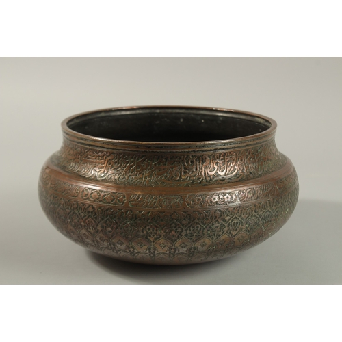 146 - A FINE 17TH-18TH CENTURY PERSIAN SAFAVID ENGRAVED TINNED COPPER BOWL, with two rows of very fine cal... 