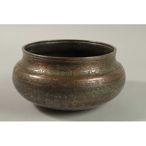 146 - A FINE 17TH-18TH CENTURY PERSIAN SAFAVID ENGRAVED TINNED COPPER BOWL, with two rows of very fine cal... 