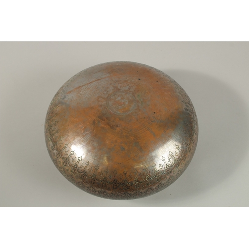 146 - A FINE 17TH-18TH CENTURY PERSIAN SAFAVID ENGRAVED TINNED COPPER BOWL, with two rows of very fine cal... 