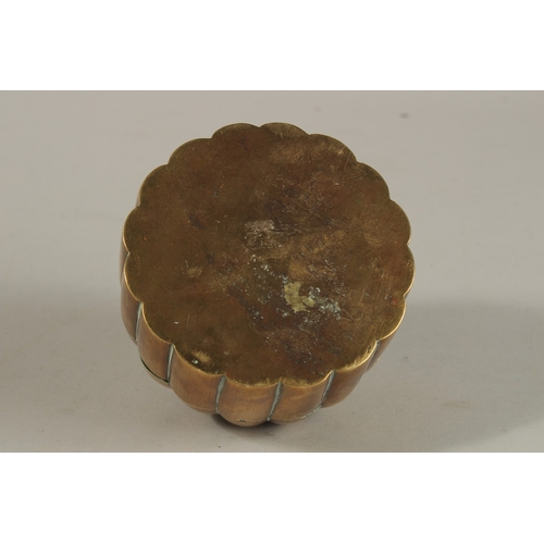 149 - A 19TH CENTURY MUGHAL INDIAN DOMED BRASS PANDAN BOX, 12cm high.