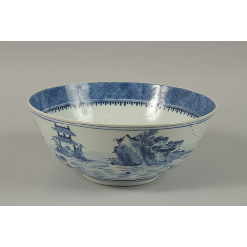 15 - A CHINESE BLUE AND WHITE PORCELAIN BOWL, with four-character mark, 26cm diameter.