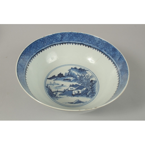 15 - A CHINESE BLUE AND WHITE PORCELAIN BOWL, with four-character mark, 26cm diameter.