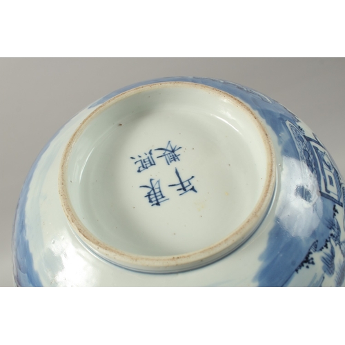 15 - A CHINESE BLUE AND WHITE PORCELAIN BOWL, with four-character mark, 26cm diameter.