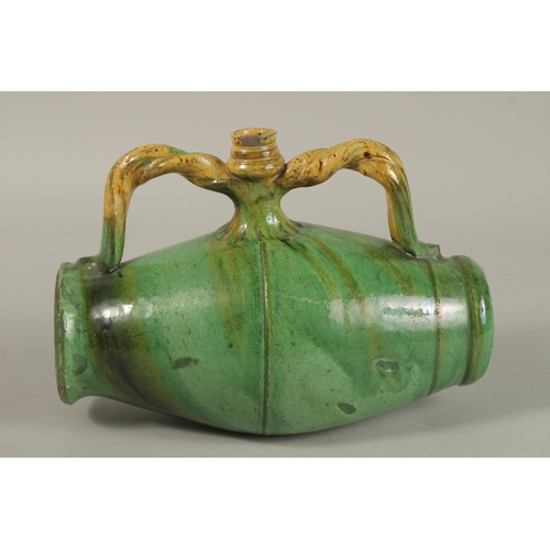 150 - A RARE 19TH CENTURY POSSIBLY OTTOMAN TURKISH CANAKKALE GLAZED POTTERY BARREL SHAPED FLASK, 24cm wide... 