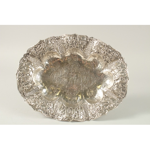 155 - A PERSIAN ENGRAVED AND CHASED SOLID SILVER FOOTED CENTREPIECE, with detachable stand, the bowl engra... 