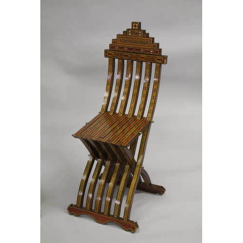 165 - A PAIR OF MOROCCAN MARQUETRY INLAID WOODEN FOLDING CHAIRS.