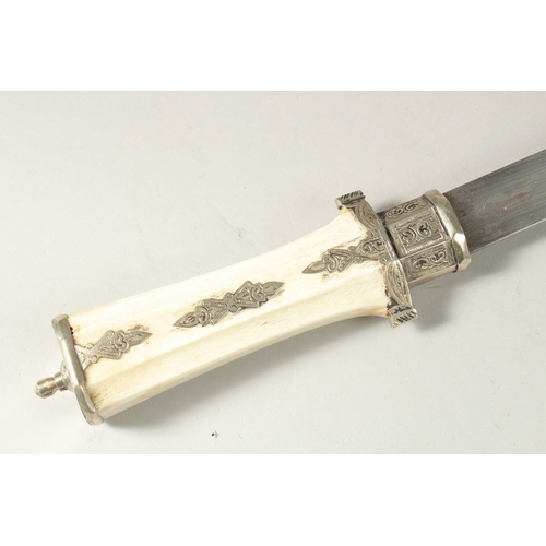 167 - A NORTH AFRICAN CAMEL BONE HANDLE DRESS DAGGER, 38cm long.