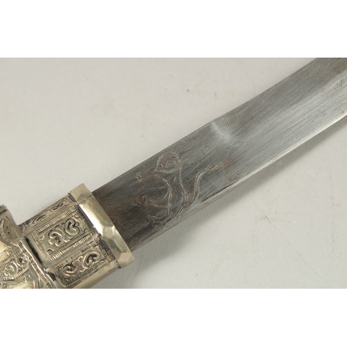 167 - A NORTH AFRICAN CAMEL BONE HANDLE DRESS DAGGER, 38cm long.