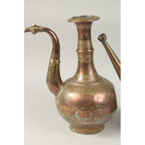 168 - A PERSIAN SAFAVID ENGRAVED COPPER EWER, together with another engraved tinned copper ewer, 33cm and ... 