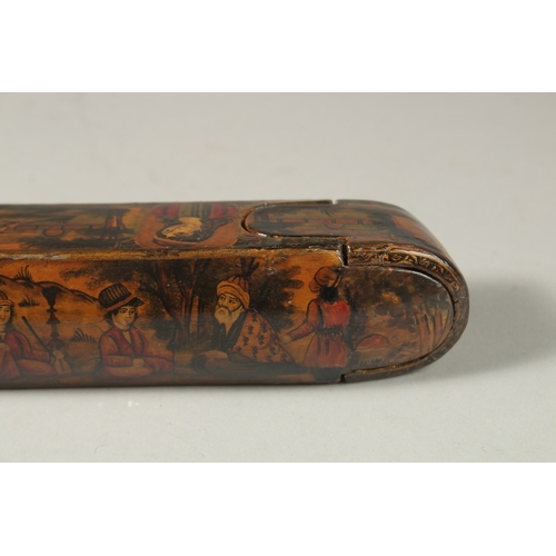 169 - A PERSIAN QAJAR LACQUER PAPIER MACHE PEN BOX, painted with figures and portraits, 22.5cm long.