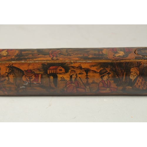 169 - A PERSIAN QAJAR LACQUER PAPIER MACHE PEN BOX, painted with figures and portraits, 22.5cm long.