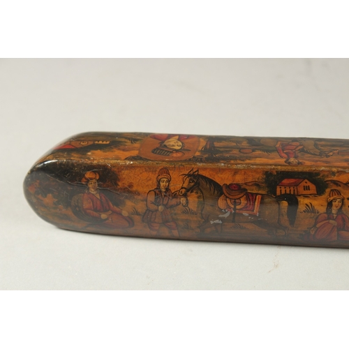 169 - A PERSIAN QAJAR LACQUER PAPIER MACHE PEN BOX, painted with figures and portraits, 22.5cm long.