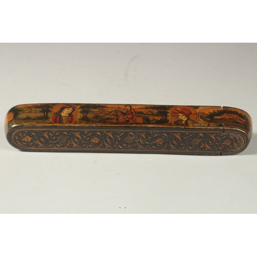 169 - A PERSIAN QAJAR LACQUER PAPIER MACHE PEN BOX, painted with figures and portraits, 22.5cm long.