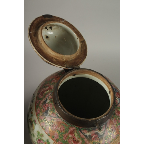 176 - A GOOD PAIR OF 18TH CENTURY CANTON ENAMELLED GINGER JARS AND COVERS, with metal mounts, painted with... 