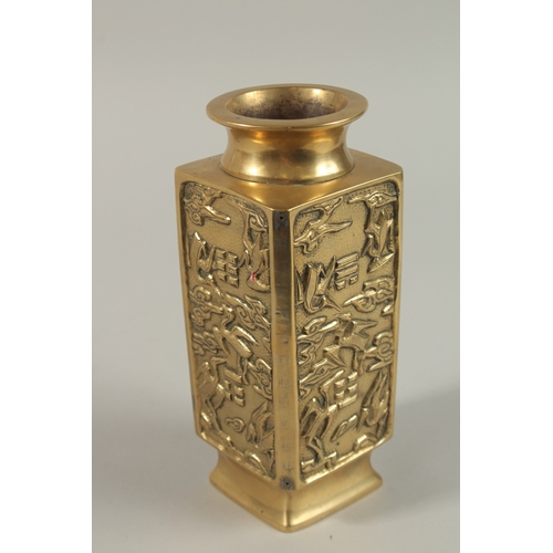 193 - A HEAVY CHINESE GILT BRONZE SQUARE-FORM VASE, with chased panels of cranes and characters, the base ... 