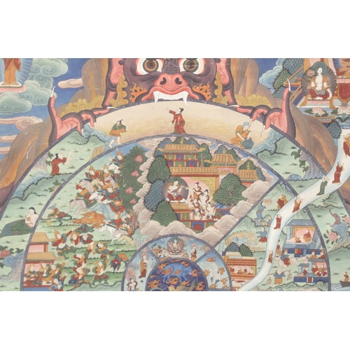 203 - A VERY FINE AND LARGE TIBETAN 'WHEEL OF LIFE' THANGKA, beautifully painted with various deities, fig... 