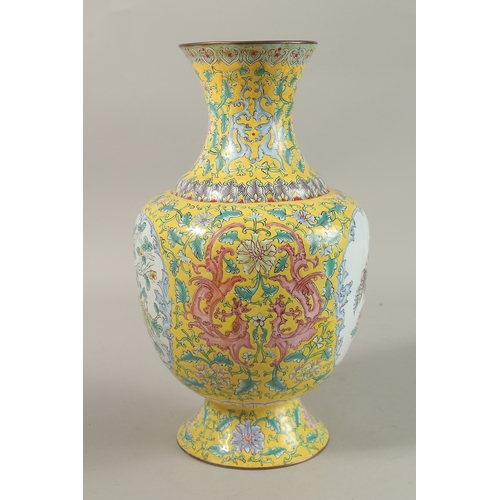 207 - A CHINESE YELLOW GROUND ENAMELLED VASE, painted with a panel depicting an exotic bird and flora, fur... 