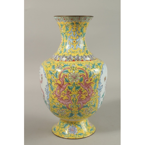 207 - A CHINESE YELLOW GROUND ENAMELLED VASE, painted with a panel depicting an exotic bird and flora, fur... 