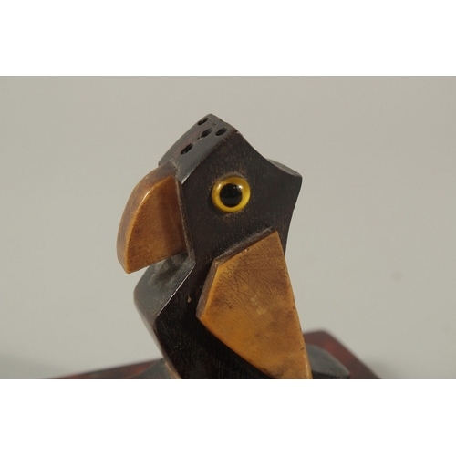 219 - AN EARLY 20TH CENTURY ART DECO DUNHILL STYLE BIRD-SHAPED MATCH HOLDER, with bakelite or cherry amber... 