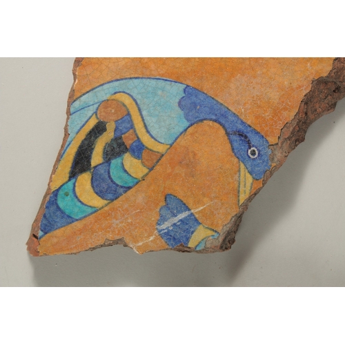 225 - THREE 17TH-18TH INDIAN TILE FRAGMENTS, with bird designs, largest 29cm wide, (3).