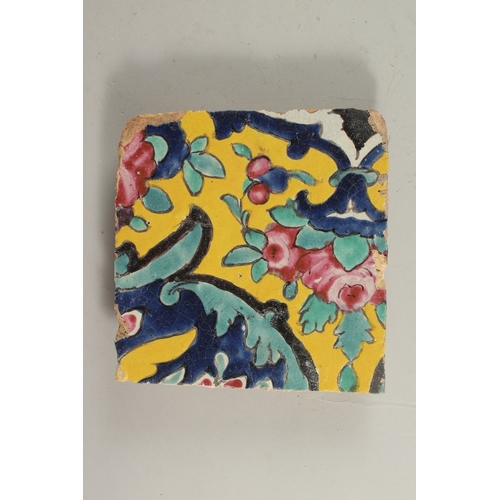 226 - AN EARLY 19TH CENTURY PERSIAN YELLOW GLAZED POTTERY TILE, 18cm x 18cm.