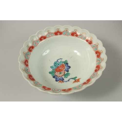 23 - FOUR CHINESE PORCELAIN BOWLS, together with a porcelain box and cover, (5).