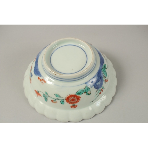 23 - FOUR CHINESE PORCELAIN BOWLS, together with a porcelain box and cover, (5).