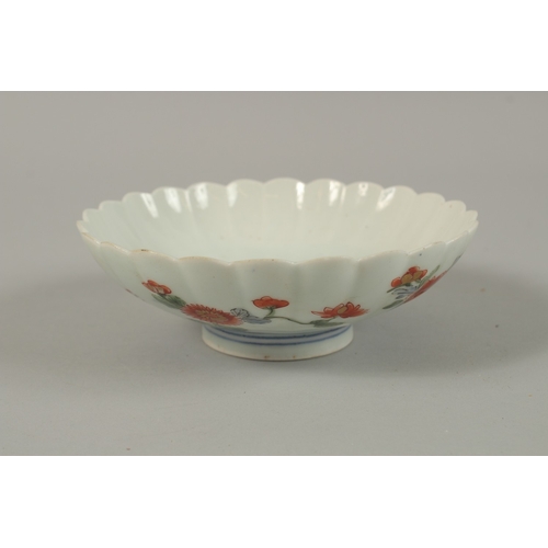 23 - FOUR CHINESE PORCELAIN BOWLS, together with a porcelain box and cover, (5).