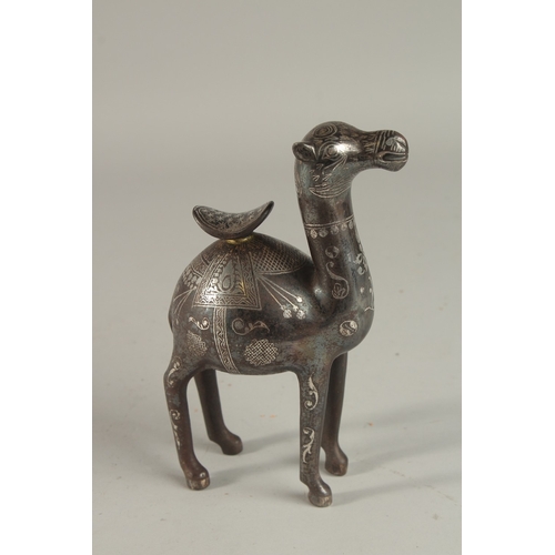 232 - A FINE PERSIAN SILVER INLAID STEEL CAMEL, 19.5cm high.