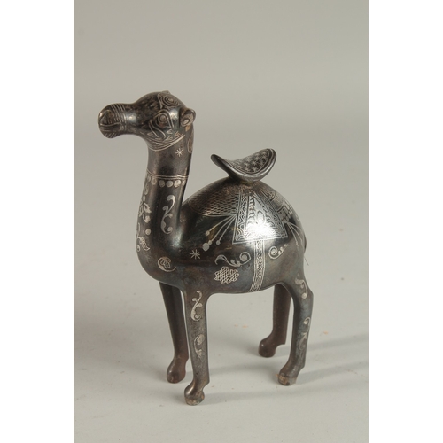 232 - A FINE PERSIAN SILVER INLAID STEEL CAMEL, 19.5cm high.