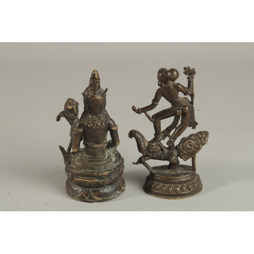 235 - A FINE 19TH CENTURY TIBETAN BRONZE FIGURE OF A FEMALE DEITY, together with an early South East Asian... 