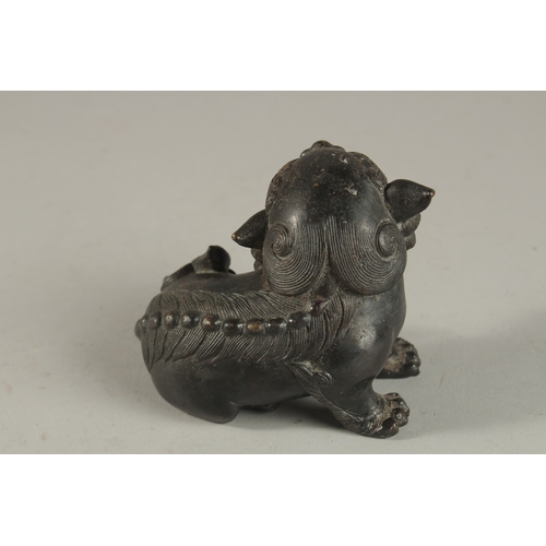 236 - A CHINESE BRONZE DOG OF FO, 8cm high.