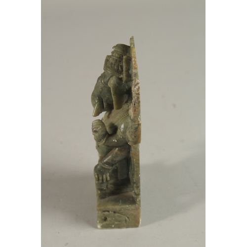 237 - A FINELY CARVED 19TH-20TH CENTURY SOUTH INDIAN GREEN STONE GANESH, 13cm high.