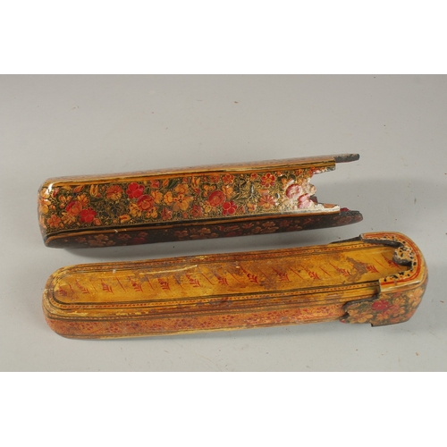 238 - TWO LARGE 19TH CENTURY INDIAN KASHMIR LACQUERED PEN BOXES, largest 31cm long, (2).