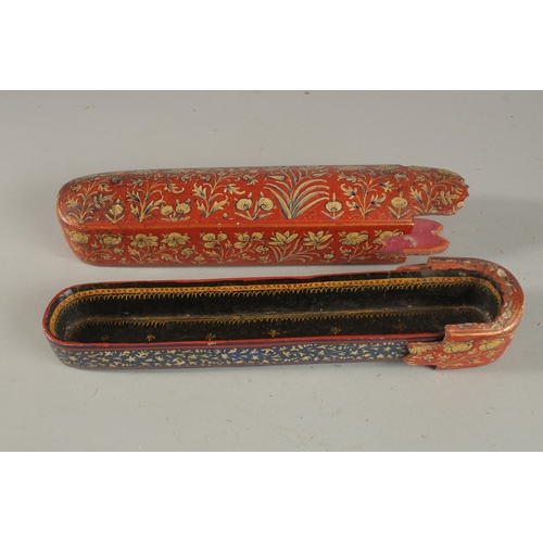 238 - TWO LARGE 19TH CENTURY INDIAN KASHMIR LACQUERED PEN BOXES, largest 31cm long, (2).