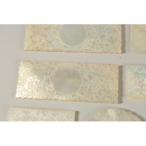 246 - A COLLECTION OF SEVEN 19TH CENTURY CANTONESE ENGRAVED MOTHER OF PEARL COUNTERS, with four Armorial p... 