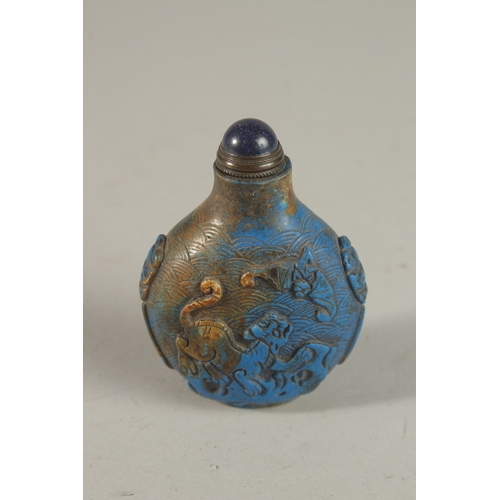 249 - A VERY FINE 19TH CENTURY CHINESE CARVED LAPIS SNUFF BOTTLE, with carved character mark, 8cm high.