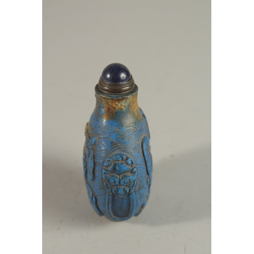 249 - A VERY FINE 19TH CENTURY CHINESE CARVED LAPIS SNUFF BOTTLE, with carved character mark, 8cm high.