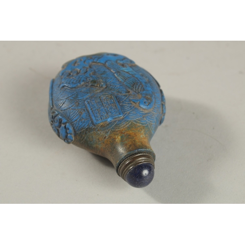 249 - A VERY FINE 19TH CENTURY CHINESE CARVED LAPIS SNUFF BOTTLE, with carved character mark, 8cm high.