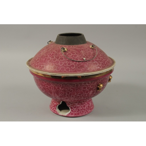 25 - A CHINESE PINK GLAZE PORCELAIN CIRCULAR WARMER AND COVER, 26cm diameter.