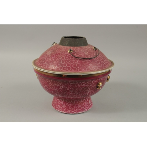 25 - A CHINESE PINK GLAZE PORCELAIN CIRCULAR WARMER AND COVER, 26cm diameter.