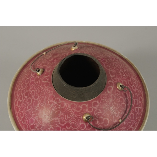 25 - A CHINESE PINK GLAZE PORCELAIN CIRCULAR WARMER AND COVER, 26cm diameter.