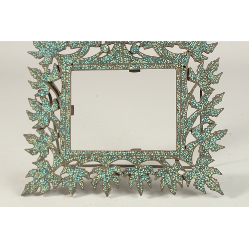 257 - A FINE 19TH CENTURY INDIAN POSSIBLY KASHMIR TURQUOISE INLAID FRAME, 26cm wide.