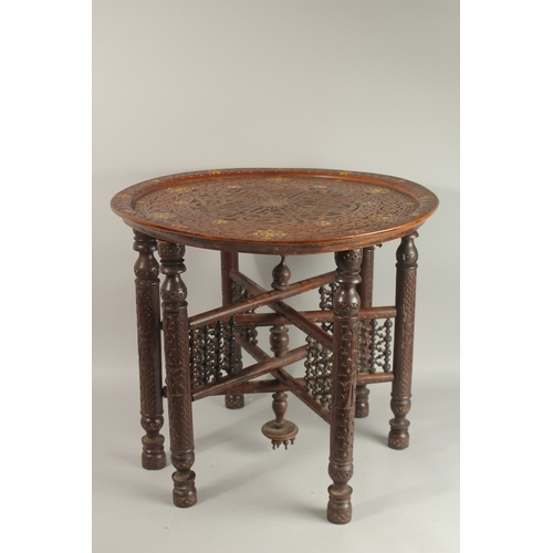 259 - A FINE 19TH CENTURY SYRIAN DAMASCUS MOTHER OF PEARL INLAID WOODEN TABLE, with folding legs.