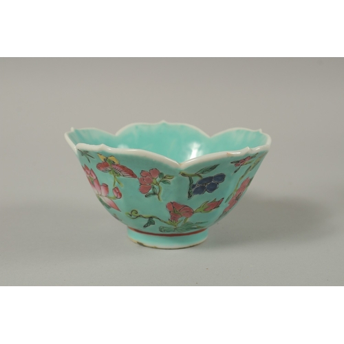 26 - A CHINESE BLUE AND WHITE PORCELAIN DRAGON BOWL, together with a pair of turquoise ground petal rim b... 