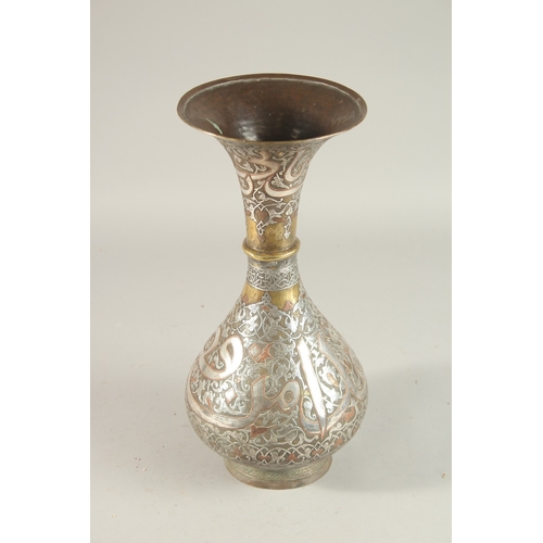 265 - A FINE 19TH CENTURY SYRIAN SILVER AND COPPER INLAID BRASS VASE, with large bands of calligraphy, 36c... 