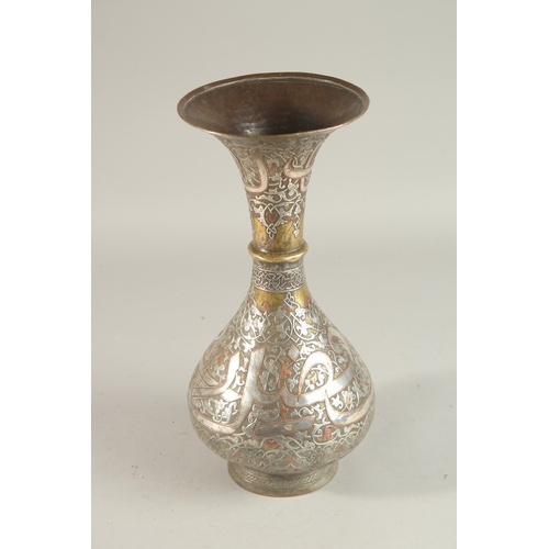 265 - A FINE 19TH CENTURY SYRIAN SILVER AND COPPER INLAID BRASS VASE, with large bands of calligraphy, 36c... 